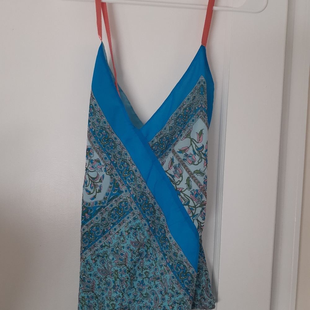 Flowy floral sleeveless blouse